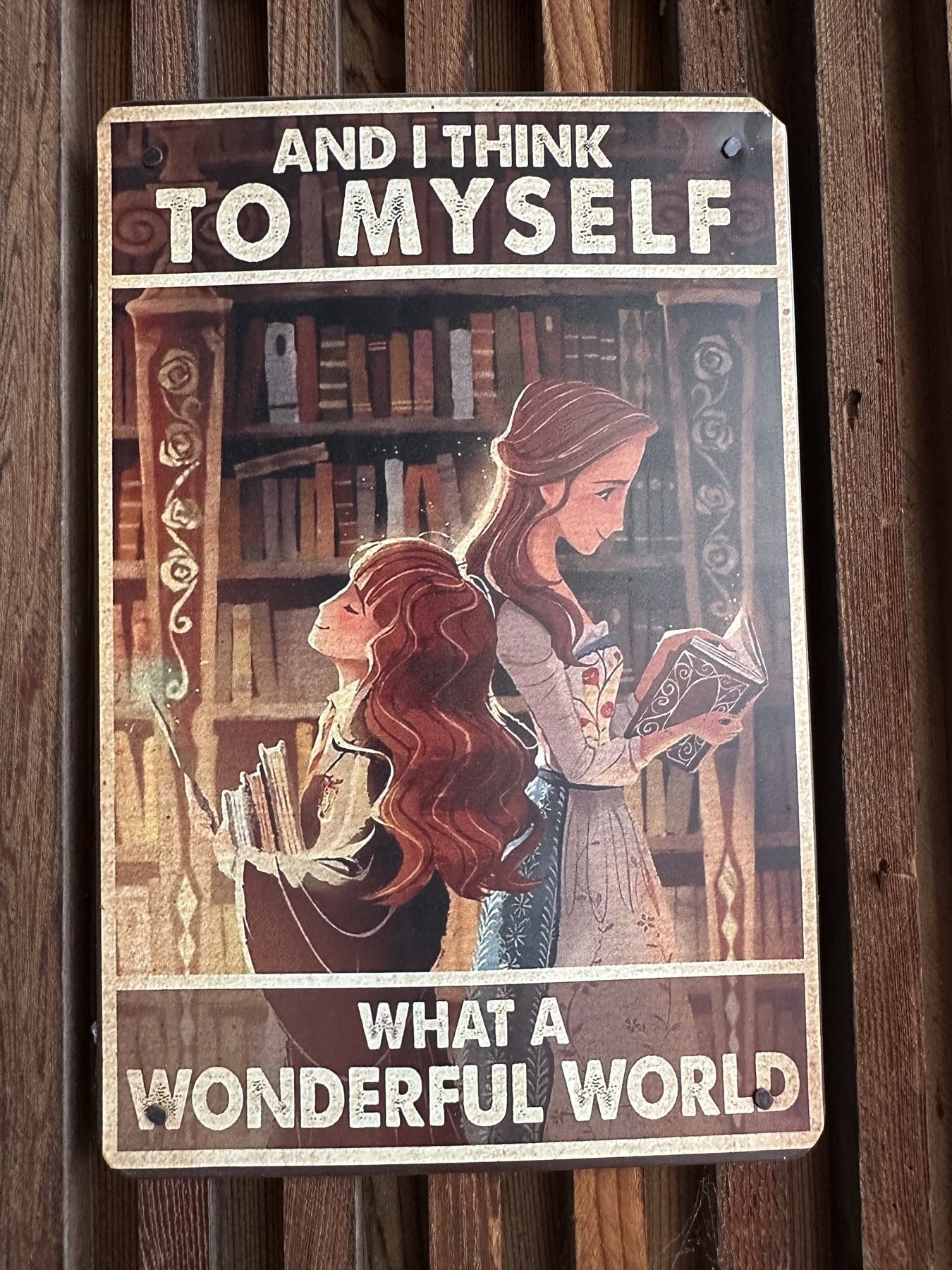 Illustration of two girls reading from bookshelves. One is Hermione from Harry Potter, the other is Belle from Beauty and the Beast, and both are drawn in the style of Emma Watson, the real-life actress and bibliophiles who played both characters.